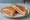 Tosti Ham: an illustration of ham and butter.