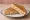 Tosti Tonijn: an illustration of tuna, cheese, mayonnaise and butter.