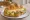 Tous Les Jours — Croissant Sandwich: an illustration of ham, egg, cheese, lettuce and more on croissant.