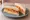 Tous Les Jours Sandwiches (뚜레쥬르): an illustration of ham, egg, kimchi, gochujang and more on white bread.
