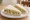 Tramezzino ai Carciofi: an illustration of artichoke, mayonnaise, parsley and lemon on white bread.