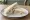 Tramezzino al Vitello Tonnato: an illustration of veal, tuna, anchovy, mayonnaise and more on white bread.