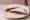 Tramezzino alla Bresaola: an illustration of olive oil and butter on white bread.