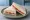 Tramezzino Mozzarella e Pomodoro: an illustration of mozzarella, tomato and mayonnaise on white bread.