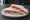 Tramezzino Prosciutto Crudo: an illustration of prosciutto and butter on white bread.