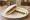 Tramezzino Salmone e Rucola: an illustration of salmon, arugula, cream cheese and mayonnaise on white bread.