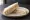 Tramezzino Tonno e Carciofini: an illustration of tuna, artichoke, mayonnaise and olive oil on white bread.