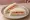 Tramezzino Tonno e Pomodoro: an illustration of tuna, tomato and mayonnaise on white bread.