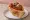 Trapizzino con Polpette al Sugo: an illustration of beef, pork, tomato and egg.