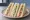 Triple Sandwich: an illustration of ham, cheese, chicken, mayonnaise and more on white bread.