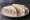 Tuna and Onion: an illustration of tuna, onion and mayonnaise on white bread.