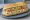 Tuna Hoagie: an illustration of tuna, mayonnaise, lettuce, tomato and more on hoagie roll.