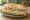 Turkey Hero: an illustration of turkey, lettuce, tomato and mayonnaise on hoagie roll.