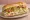 Turkey Hoagie: an illustration of turkey, lettuce and mayonnaise on hoagie roll.