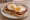 Uitsmijter Bacon: an illustration of bacon, egg and butter.