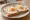 Uitsmijter Natuur: an illustration of egg and butter.