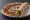 Urfa Lahmacun: an illustration of lamb, onion, tomato, parsley and more.
