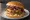 Utah Pastrami Burger: an illustration of beef, pastrami, cheese, russian dressing and more on burger bun.