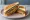 Veg Cutlet Sandwich: an illustration of potato and carrot on white bread.
