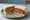 Wagyu Steak Sando (和牛ステーキサンド): an illustration of butter, mustard and maggi seasoning sauce on shokupan.