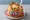 Walking Taco: an illustration of beef, cheese, lettuce, tomato and more.