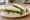 Watercress Sandwich: an illustration of watercress and butter on white bread.