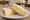 Wensleydale Sandwich: an illustration of butter on white bread.