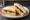 West Country Farmhouse Cheddar: an illustration of cheddar cheese, butter and chutney on white bread.