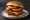Western Bacon Cheeseburger: an illustration of beef, bacon, cheese, onion rings and more on burger bun.