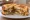 Whataburger Patty Melt: an illustration of beef, american cheese, monterey jack, onion and more on white bread.