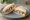 Whelk Sandwich: an illustration of butter, vinegar and pepper on white bread.