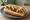 White Hot: an illustration of pork and veal on hot dog bun.