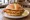 Wiener Schnitzel Brötchen: an illustration of veal, egg and butter on kaiser roll.