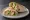 Wrap (International): an illustration of chicken, lettuce and tomato on tortilla.