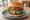 Yale Blue Burger: an illustration of beef, blue cheese, lettuce, tomato and more on burger bun.