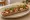 Zapiekanka Fit: an illustration of chicken, mushroom, cheese, tomato and more.